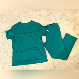 Lightly used green Figs scrubs size medium.